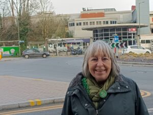 Photo of Councillor Sue Sinden outside Redhill Station