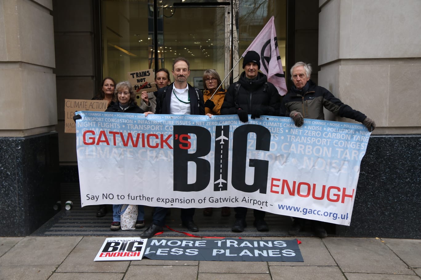 Protesters holding banner